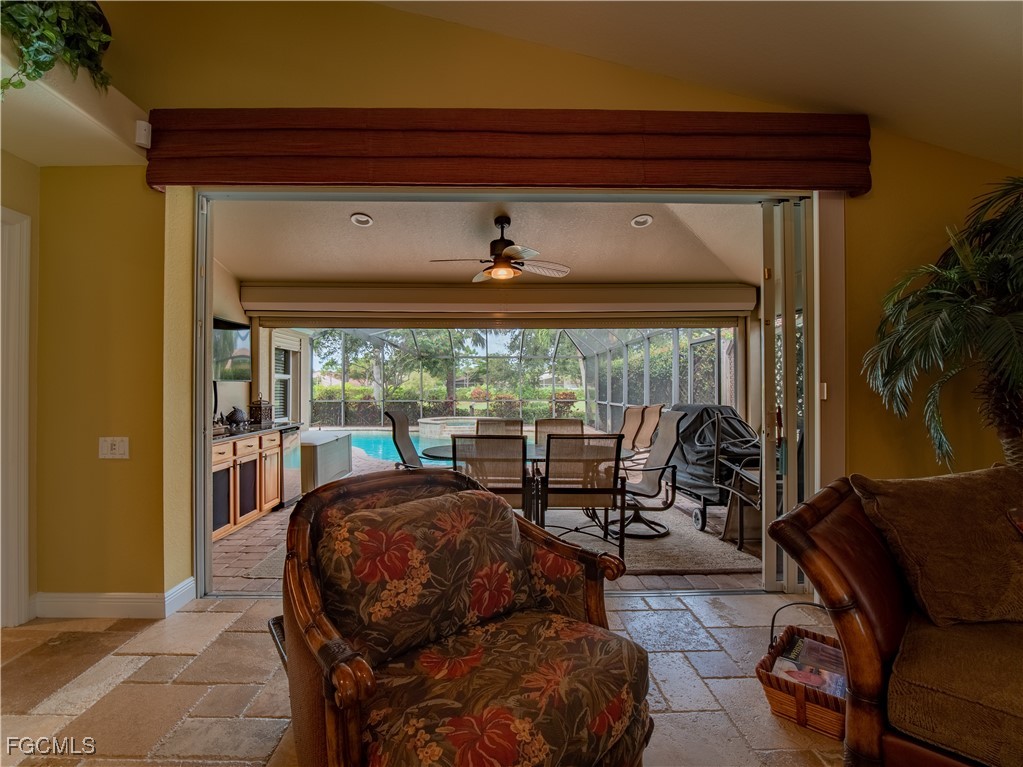 20311 Rookery Drive Estero, FL 33928 - Photo 17 of 29 a living room with furniture and a large window