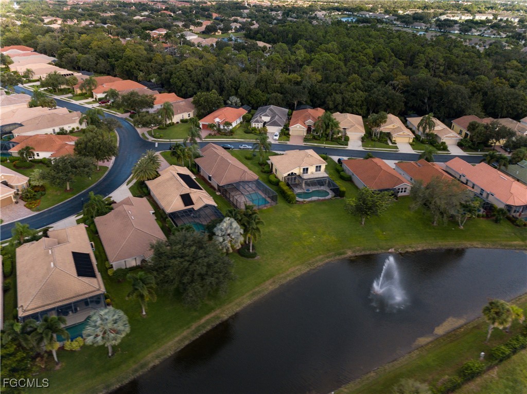 20311 Rookery Drive Estero, FL 33928 - Photo 28 of 29 an aerial view of a house with a garden and lake view