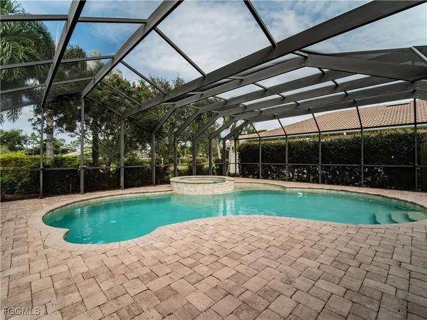 a view of a backyard with pathway