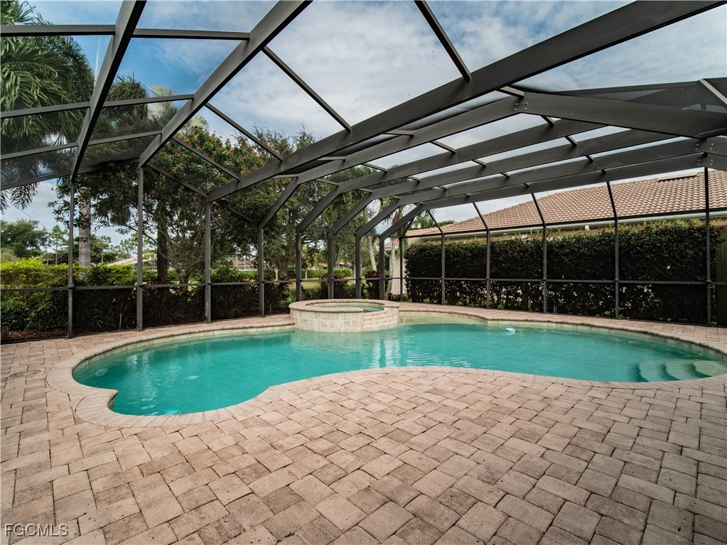 20311 Rookery Drive Estero, FL 33928 - Photo 3 of 29 a view of a backyard with pathway