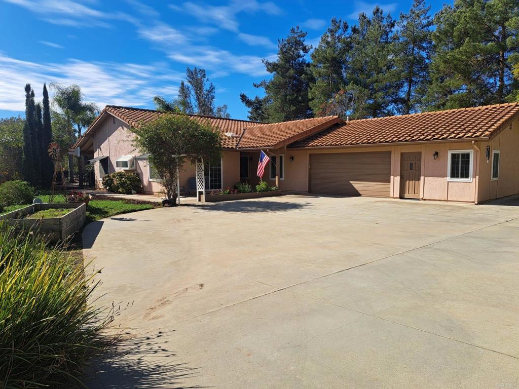 40752 Via De La Roca Fallbrook, CA 92028 - Photo 2 of 37 a view of a house with a outdoor space