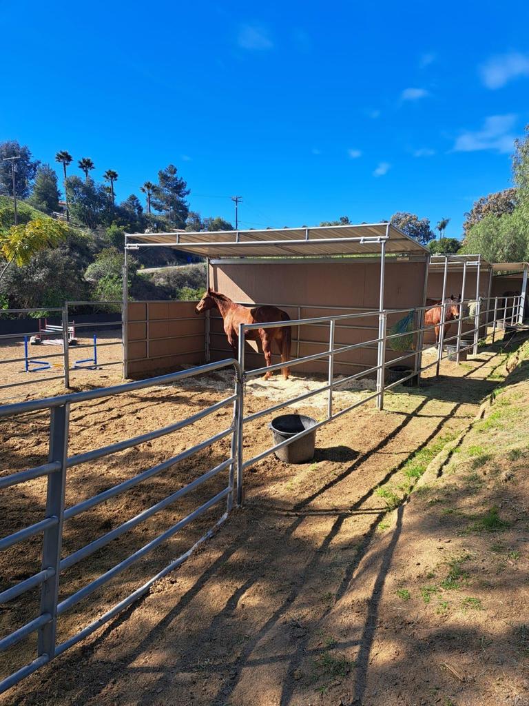 40752 Via De La Roca Fallbrook, CA 92028 - Photo 26 of 37 a view of a terrace with wooden floor and seating space
