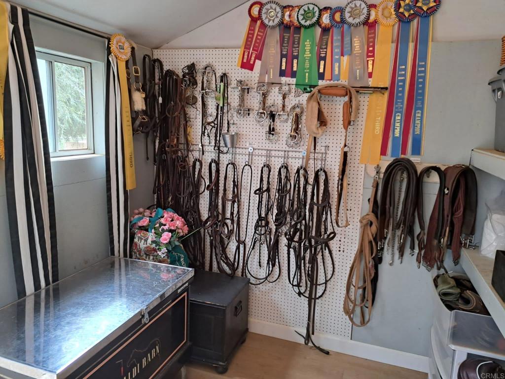 40752 Via De La Roca Fallbrook, CA 92028 - Photo 30 of 37 a view of walk in closet with clothes