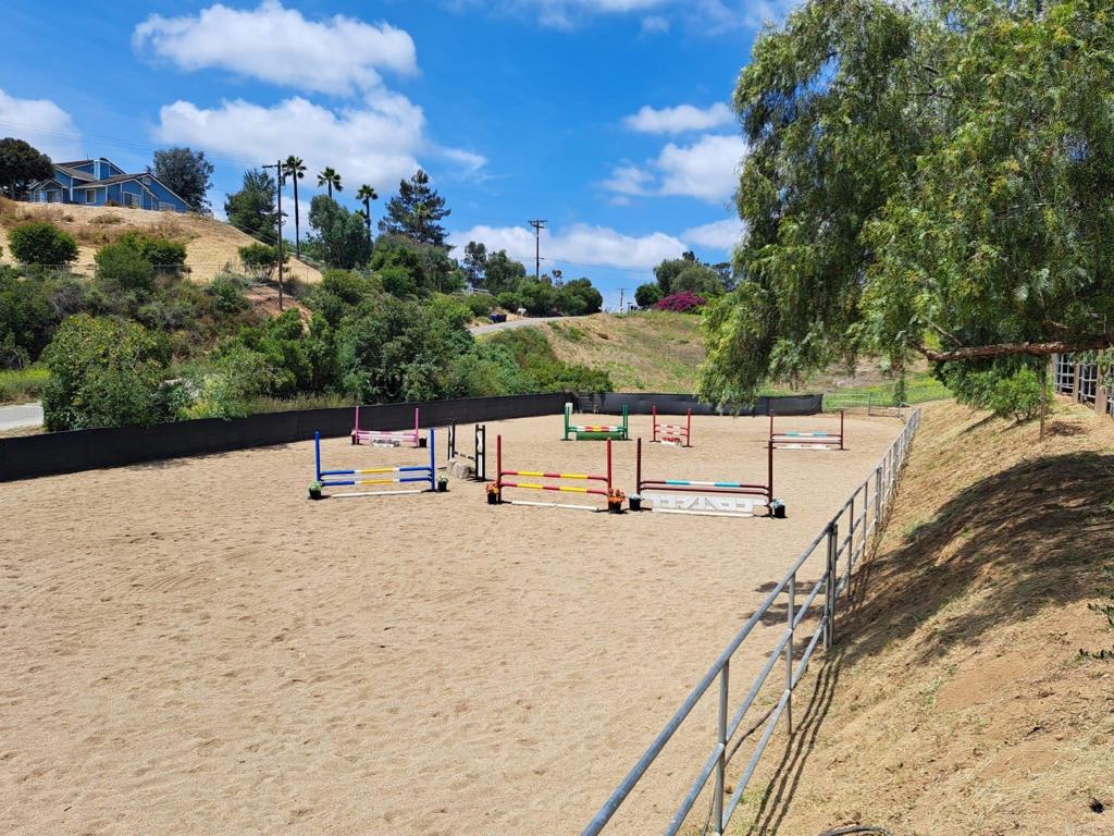 40752 Via De La Roca Fallbrook, CA 92028 - Photo 32 of 37 a view of a road with trees in the background