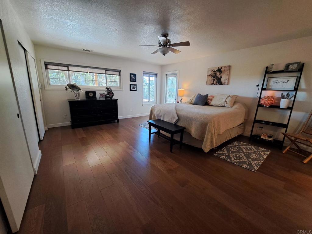 40752 Via De La Roca Fallbrook, CA 92028 - Photo 9 of 37 a bedroom with furniture and a window