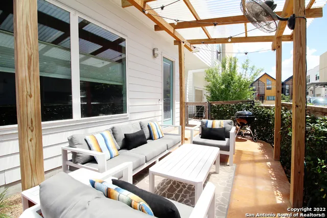 a view of balcony with furniture and outdoor view