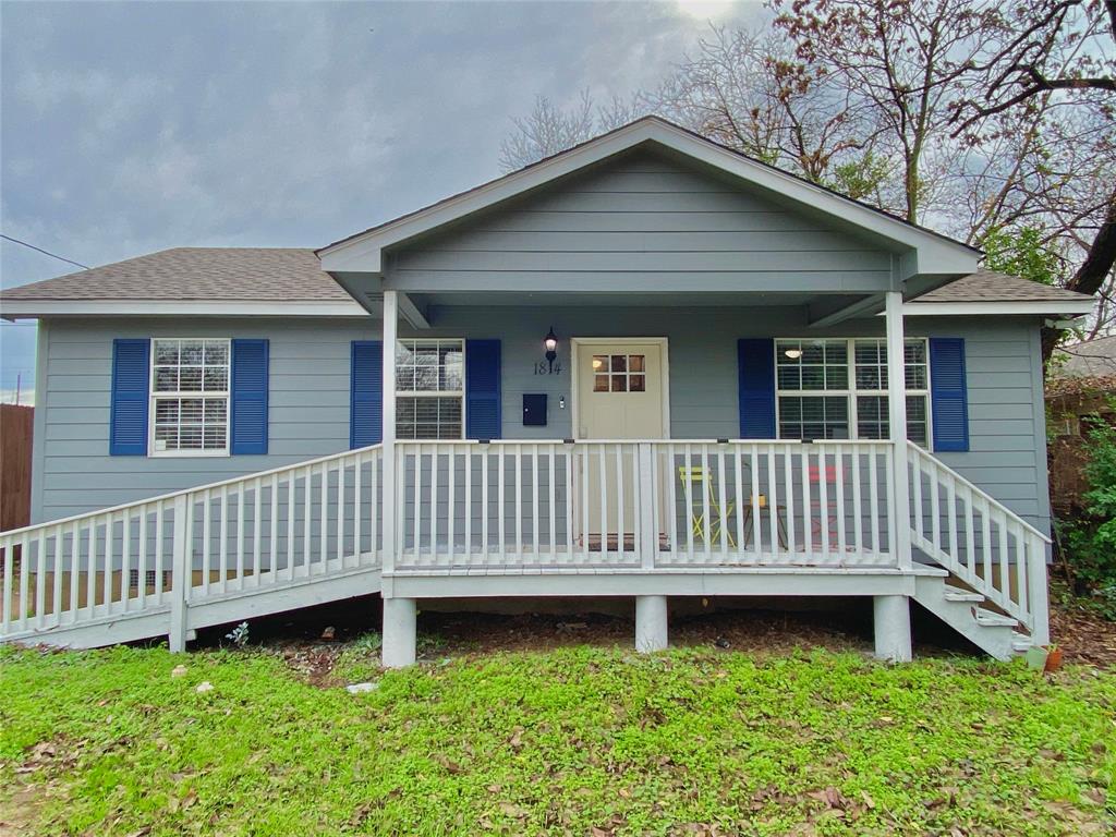 1814 Pueblo Street Dallas, TX 75212 - Photo 1 of 1 a view of a house with a yard and a bench