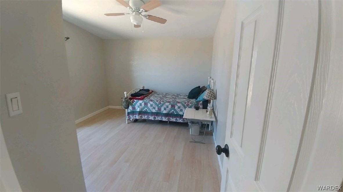 3634 Bibo Road Golden Valley, AZ 86413 - Photo 25 of 44 a living room with furniture and a window