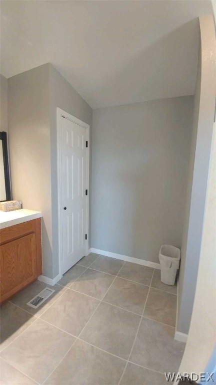 3634 Bibo Road Golden Valley, AZ 86413 - Photo 39 of 44 a bathroom with a sink a toilet and a window