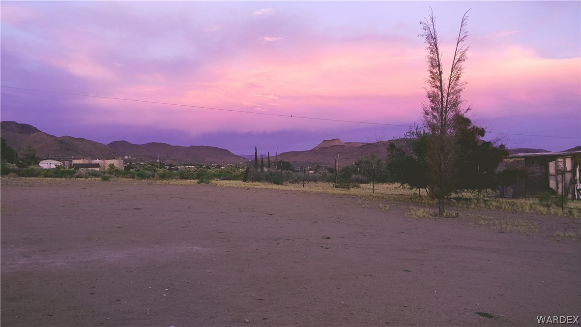 3634 Bibo Road Golden Valley, AZ 86413 - Photo 5 of 44 a view of lake with mountain in the background