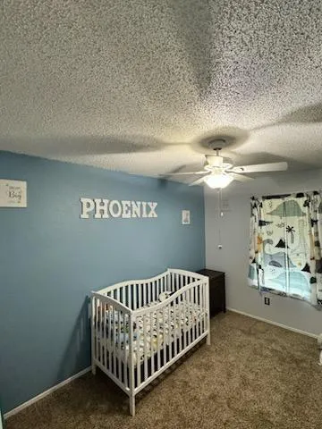 a view of a hallway with a bedroom