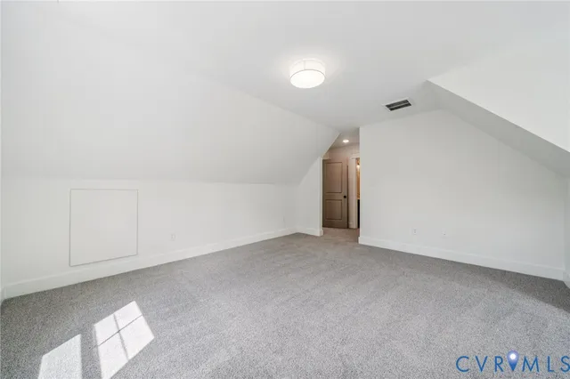 an empty room with an entryway