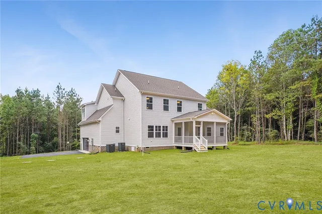 a view of a house with a big yard