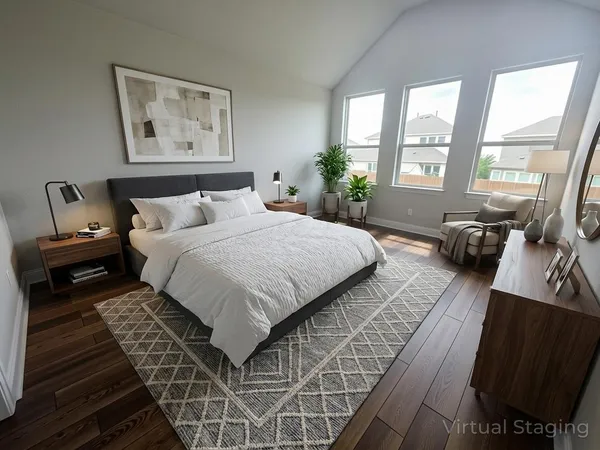 a bedroom with a bed wooden floor and a large window