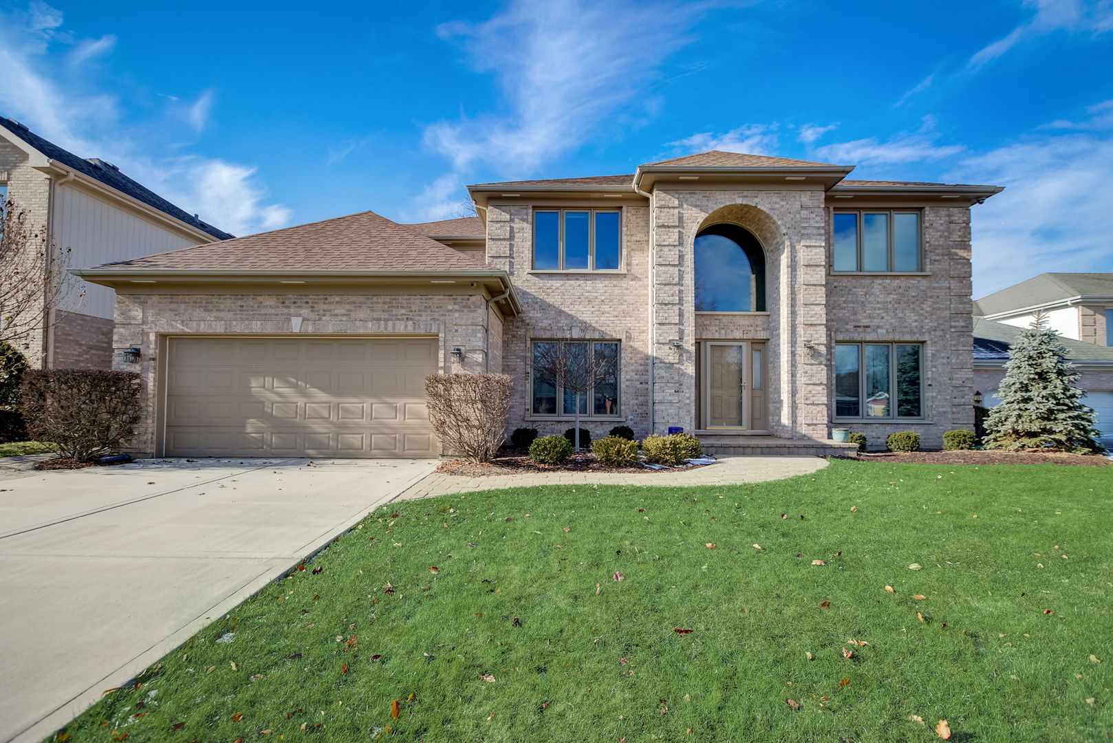 206 Meier Road Arlington Heights, IL 60005 - Photo 1 of 42 a front view of a house with swimming pool having outdoor seating