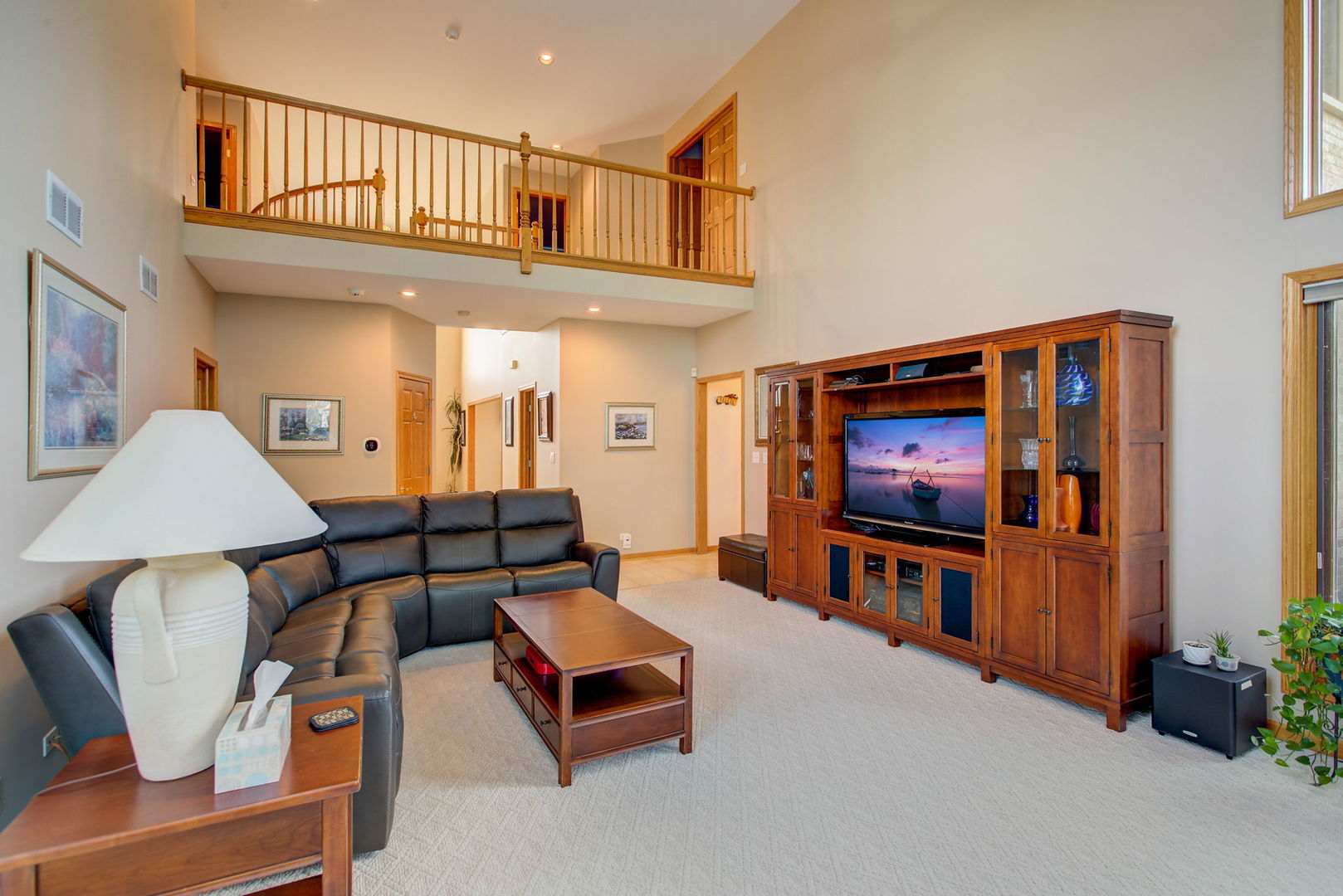 206 Meier Road Arlington Heights, IL 60005 - Photo 11 of 42 a living room with furniture and a flat screen tv