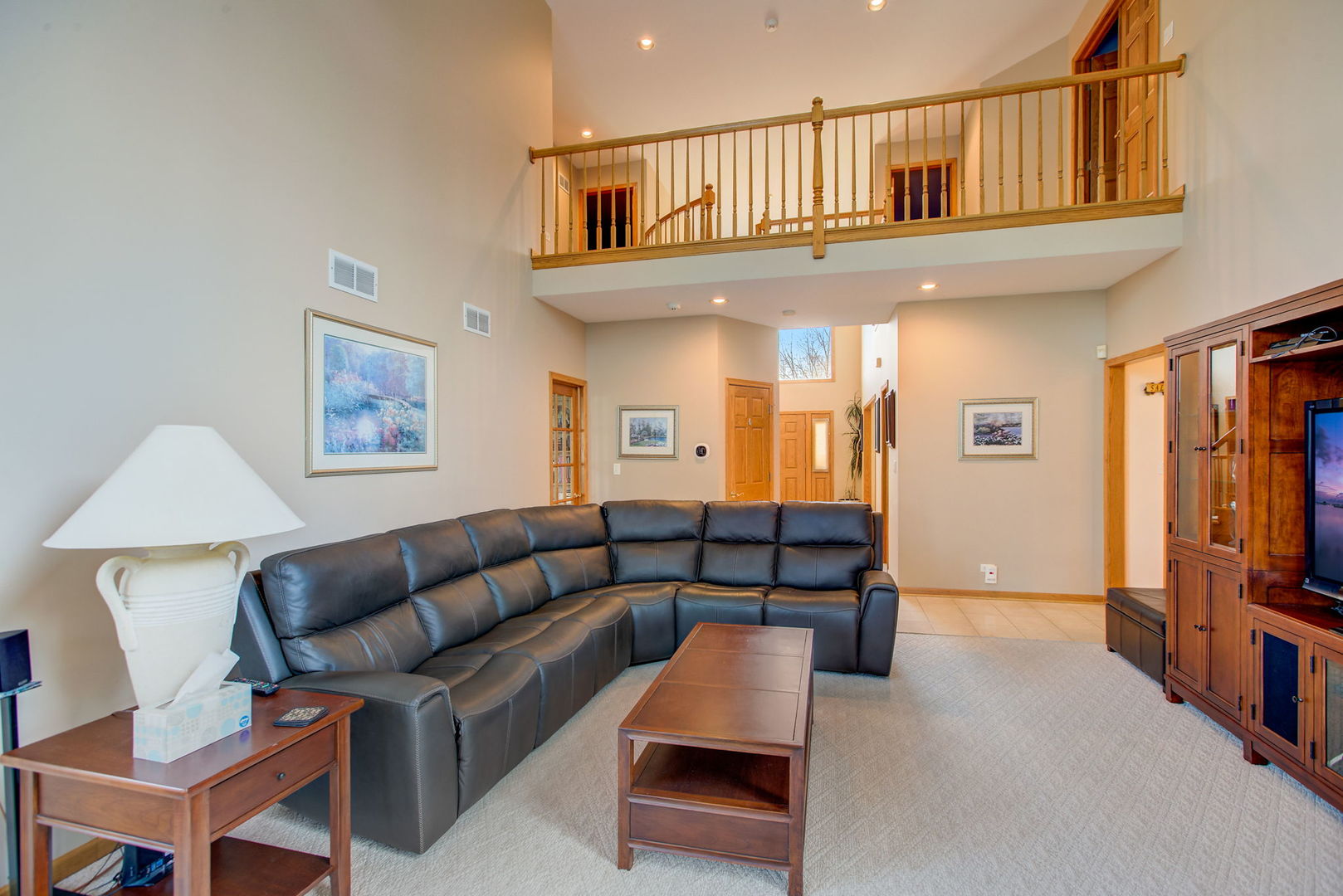 206 Meier Road Arlington Heights, IL 60005 - Photo 12 of 42 a living room with furniture and a flat screen tv