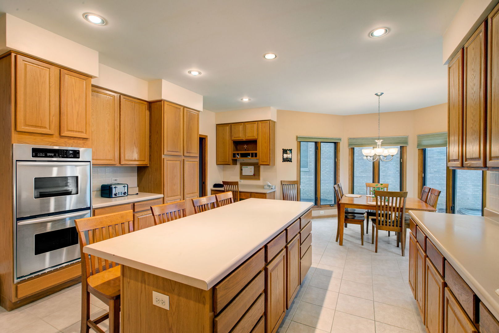 206 Meier Road Arlington Heights, IL 60005 - Photo 13 of 42 a large kitchen with kitchen island a large island in it