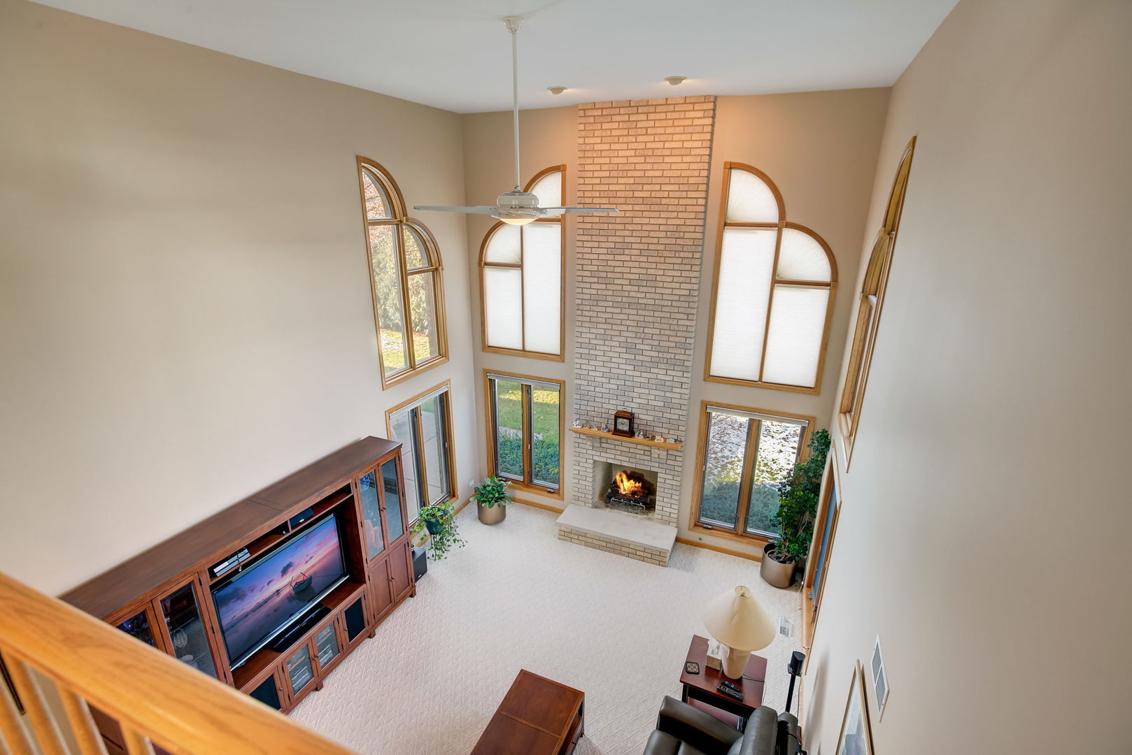 206 Meier Road Arlington Heights, IL 60005 - Photo 21 of 42 a living room with furniture and a flat screen tv