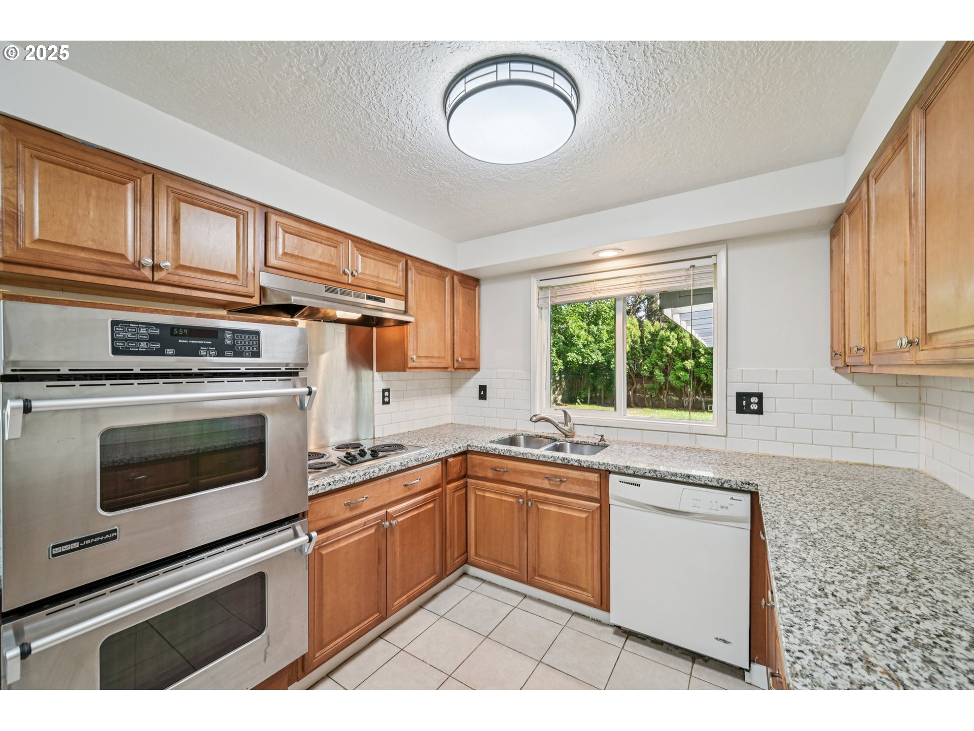 1631 North Clark Street Cornelius, OR 97113 - Photo 11 of 29 a kitchen with cabinets appliances and a sink
