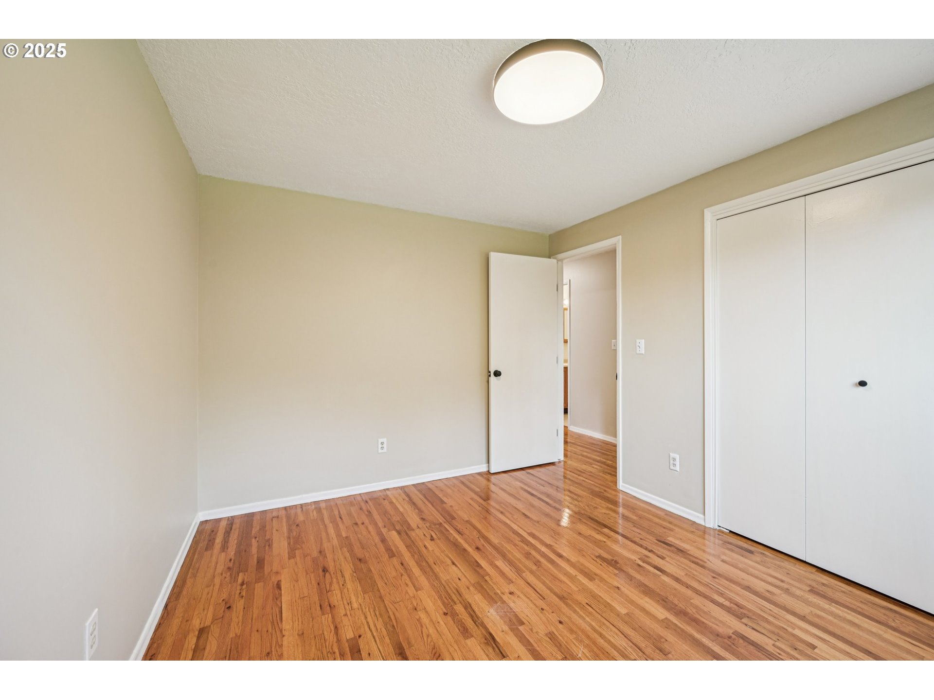 1631 North Clark Street Cornelius, OR 97113 - Photo 15 of 29 a view of an empty room and wooden floor