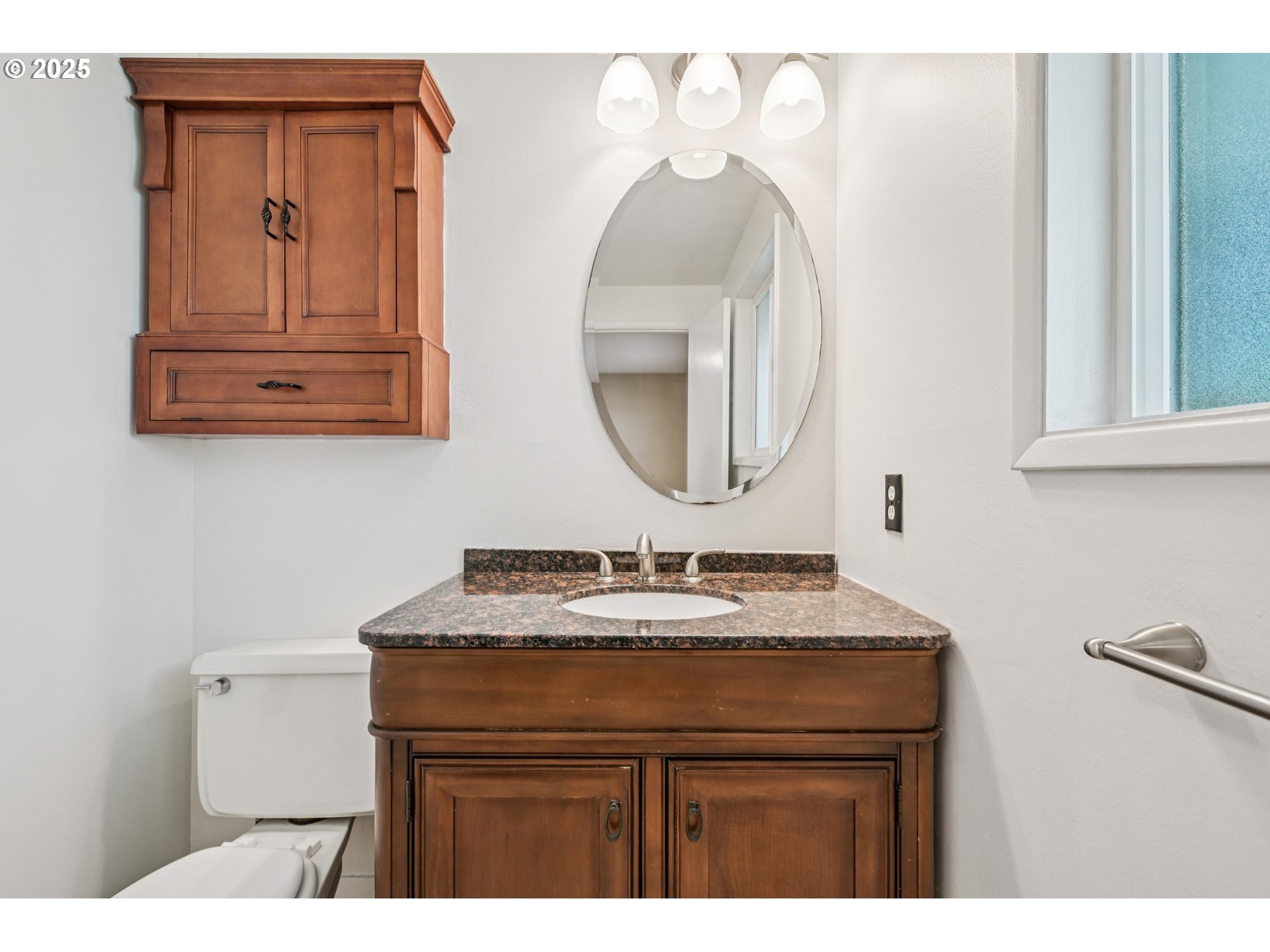 1631 North Clark Street Cornelius, OR 97113 - Photo 18 of 29 a bathroom with a sink vanity and a mirror