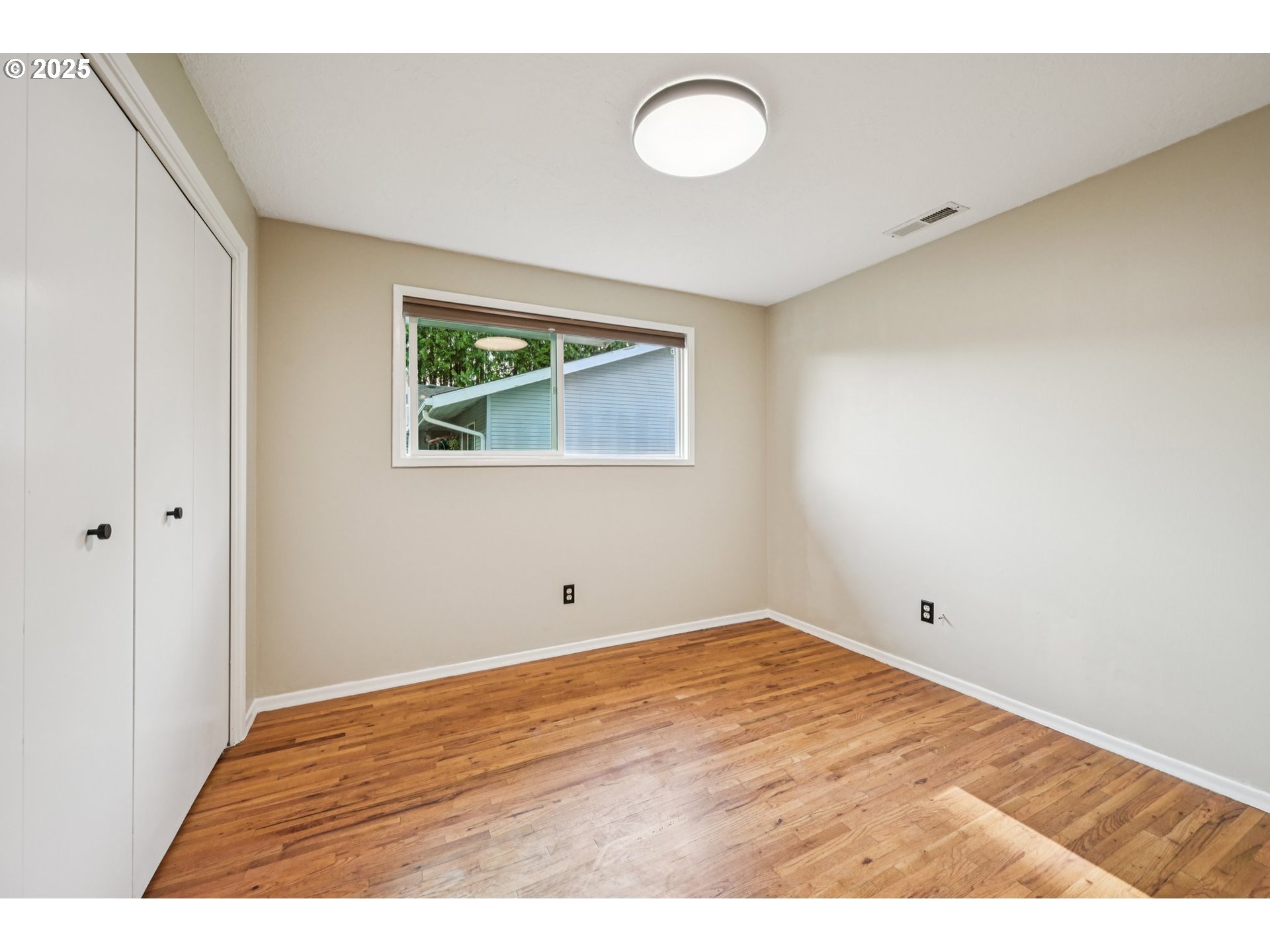1631 North Clark Street Cornelius, OR 97113 - Photo 19 of 29 a view of empty room with wooden floor