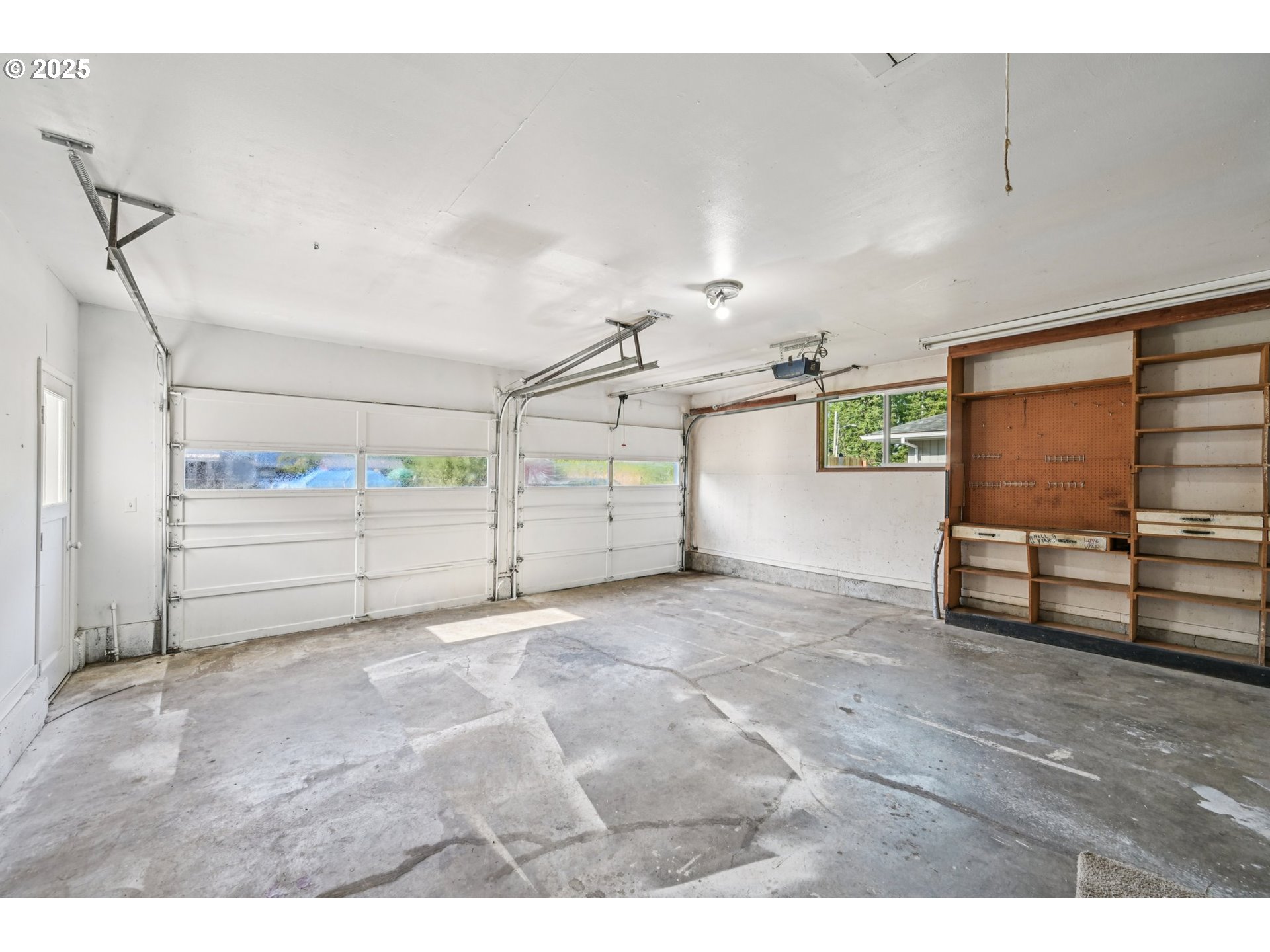 1631 North Clark Street Cornelius, OR 97113 - Photo 25 of 29 a view of a livingroom with furniture and a garage