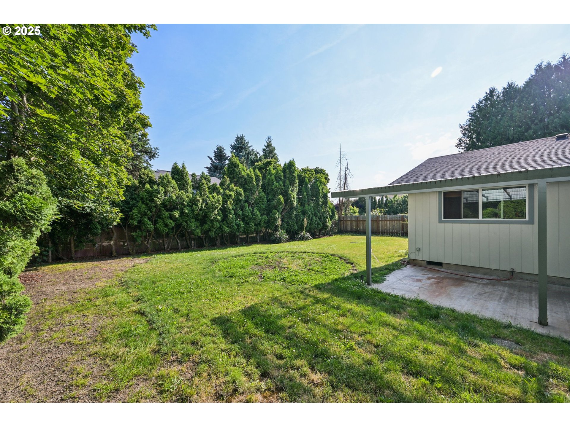 1631 North Clark Street Cornelius, OR 97113 - Photo 27 of 29 a view of a backyard with a garden and entertaining space