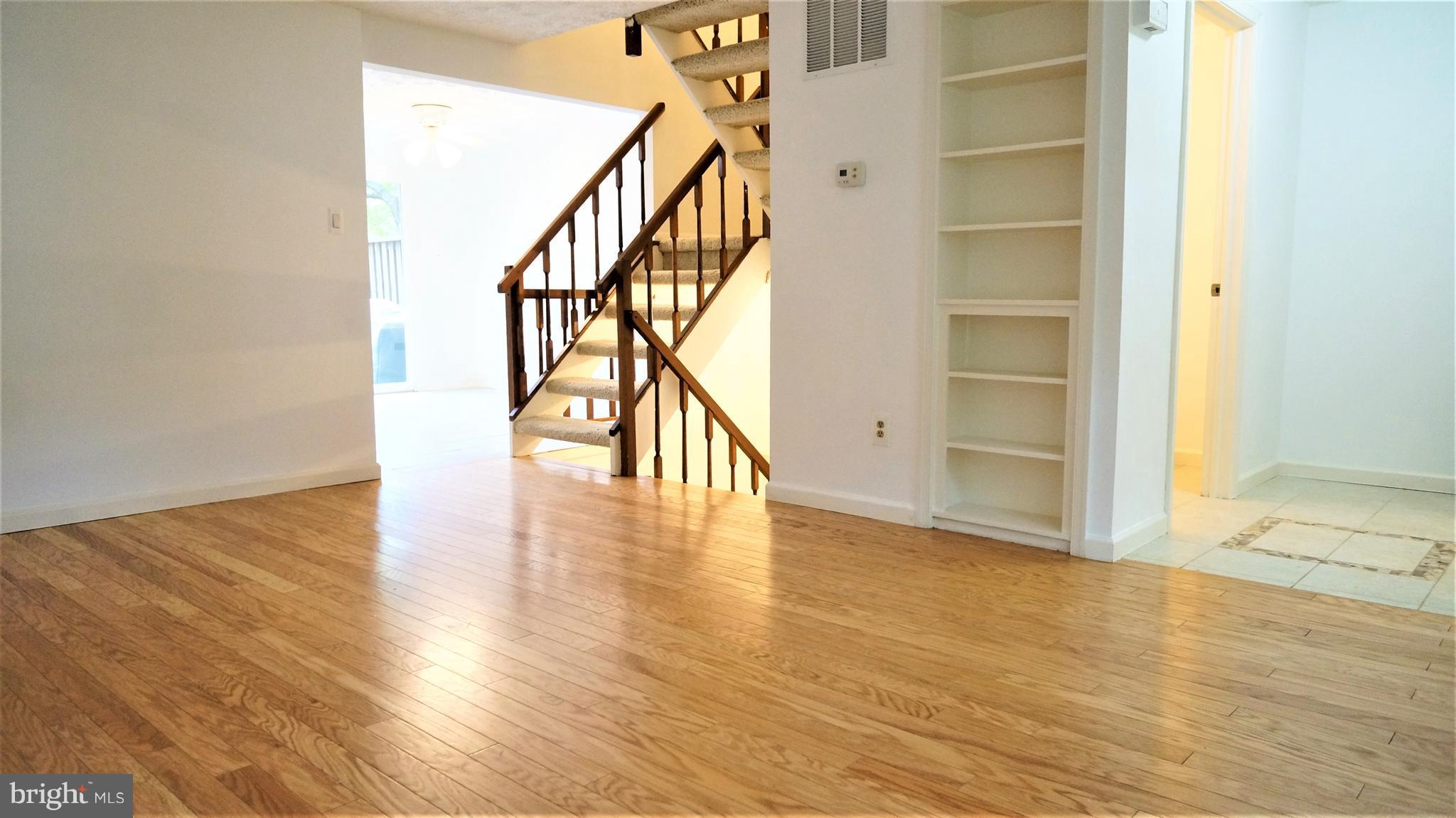 11539 Ivy Bush Court Reston, VA 20191 - Photo 24 of 30 Living Room with Built In Bookcase