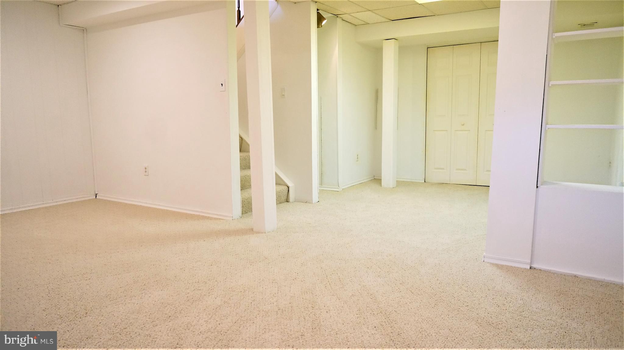 11539 Ivy Bush Court Reston, VA 20191 - Photo 27 of 30 Laundry Room + Extra Storage through closet doors