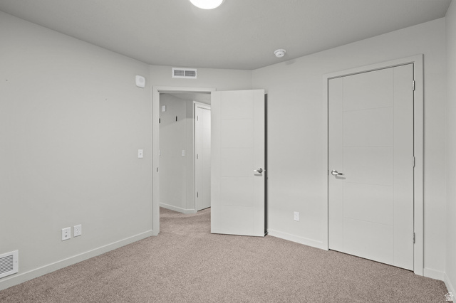 64 West 600 South, Unit C205 Springville, UT 84663 - Photo 15 of 28 Unfurnished bedroom with carpet flooring and baseboards