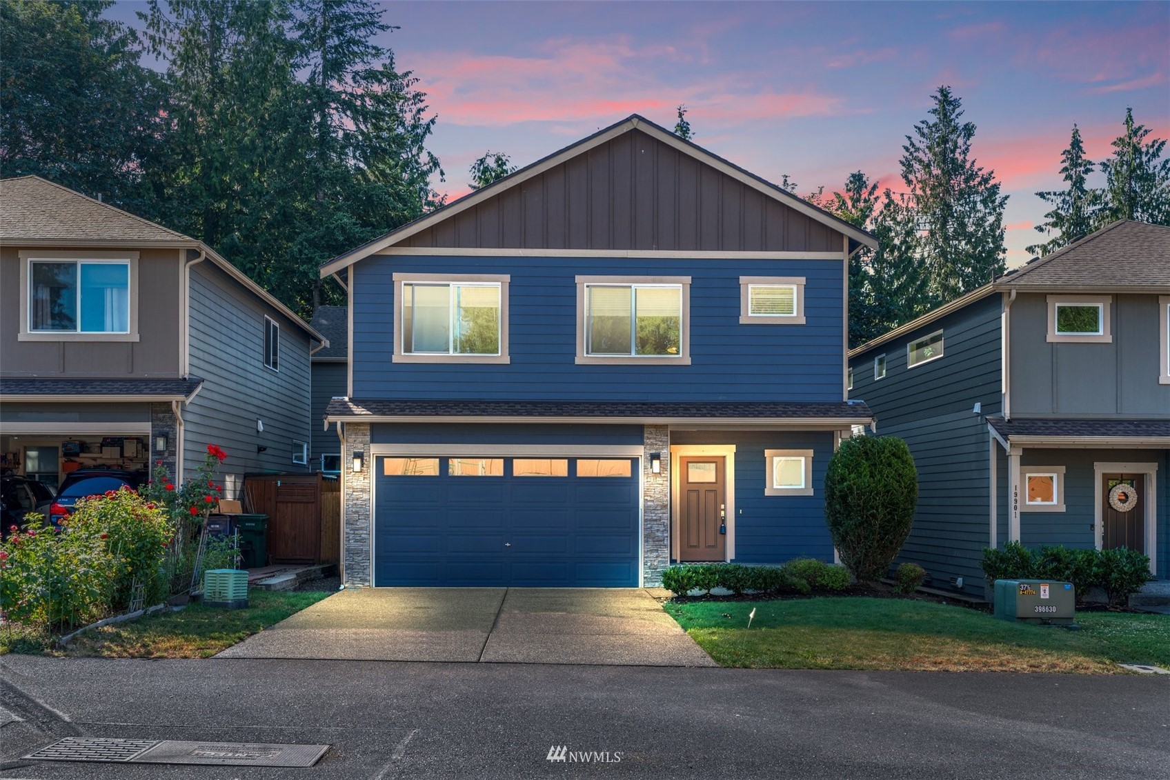19833 3rd Avenue Southeast Bothell, WA 98012 - Photo 1 of 27 a front view of a house with garden