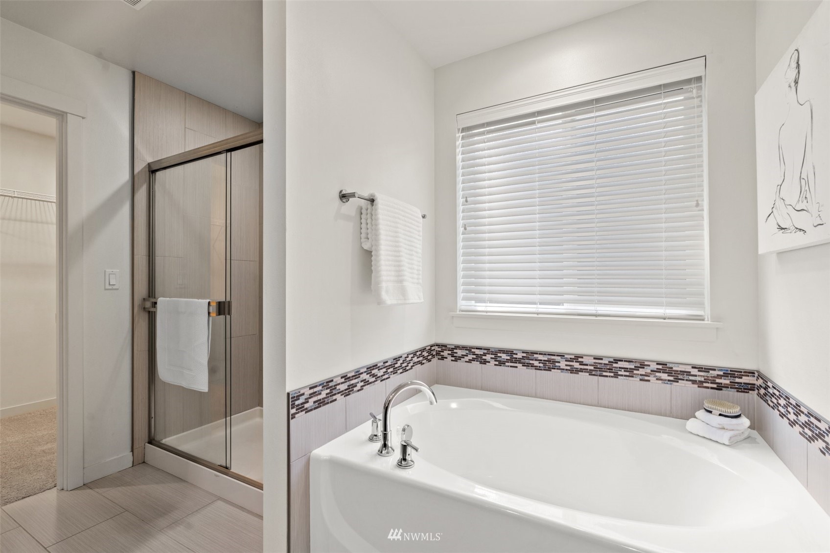 19833 3rd Avenue Southeast Bothell, WA 98012 - Photo 21 of 27 a white bath tub sitting next to a shower