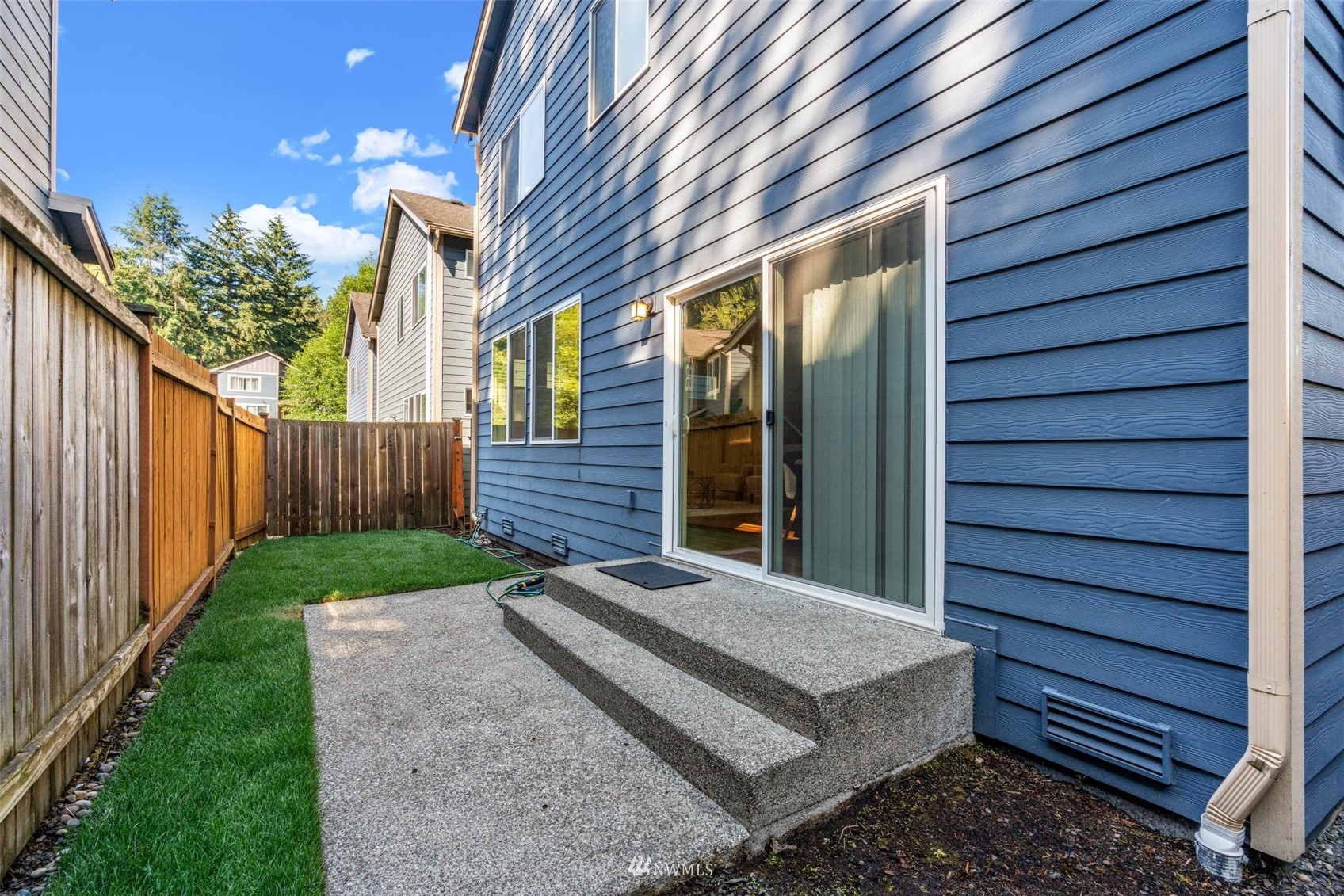 19833 3rd Avenue Southeast Bothell, WA 98012 - Photo 26 of 27 a view of a house with a backyard