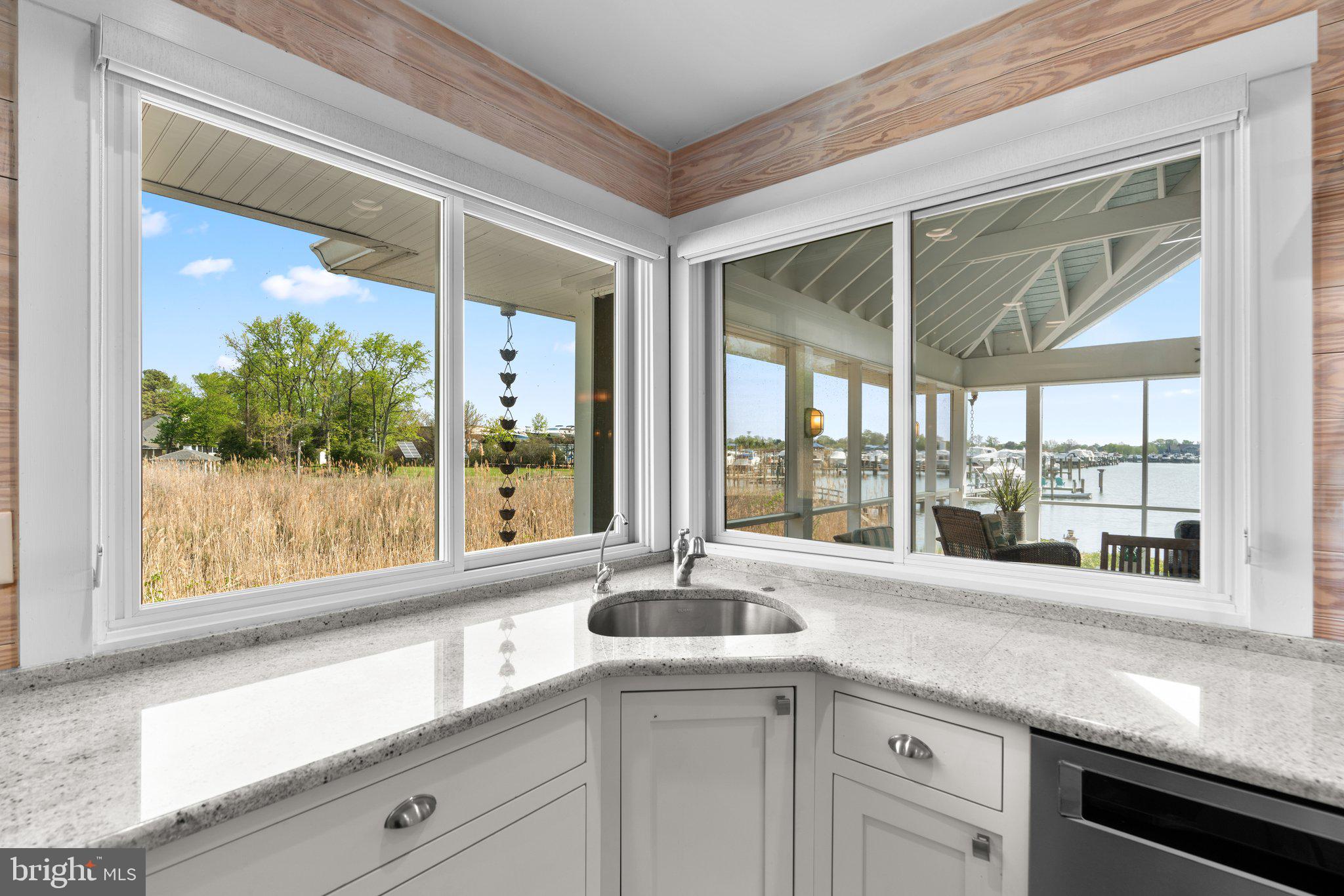 1080 Mayo Road Edgewater, MD 21037 - Photo 15 of 57 a kitchen with granite countertop a large window and a sink