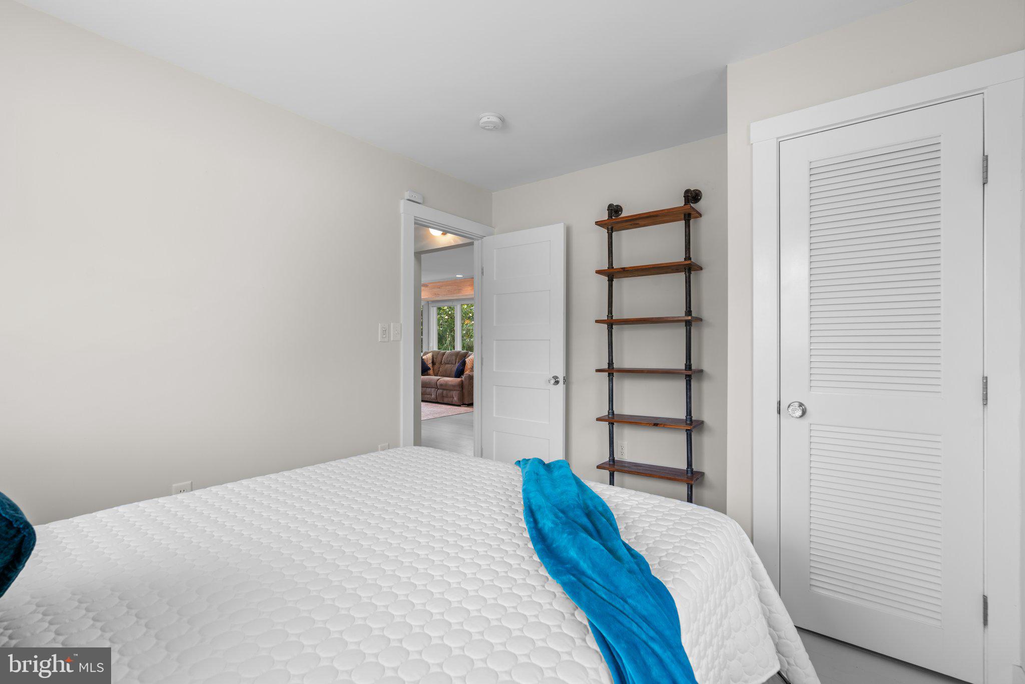 1080 Mayo Road Edgewater, MD 21037 - Photo 25 of 57 a bedroom with a bed and a closet