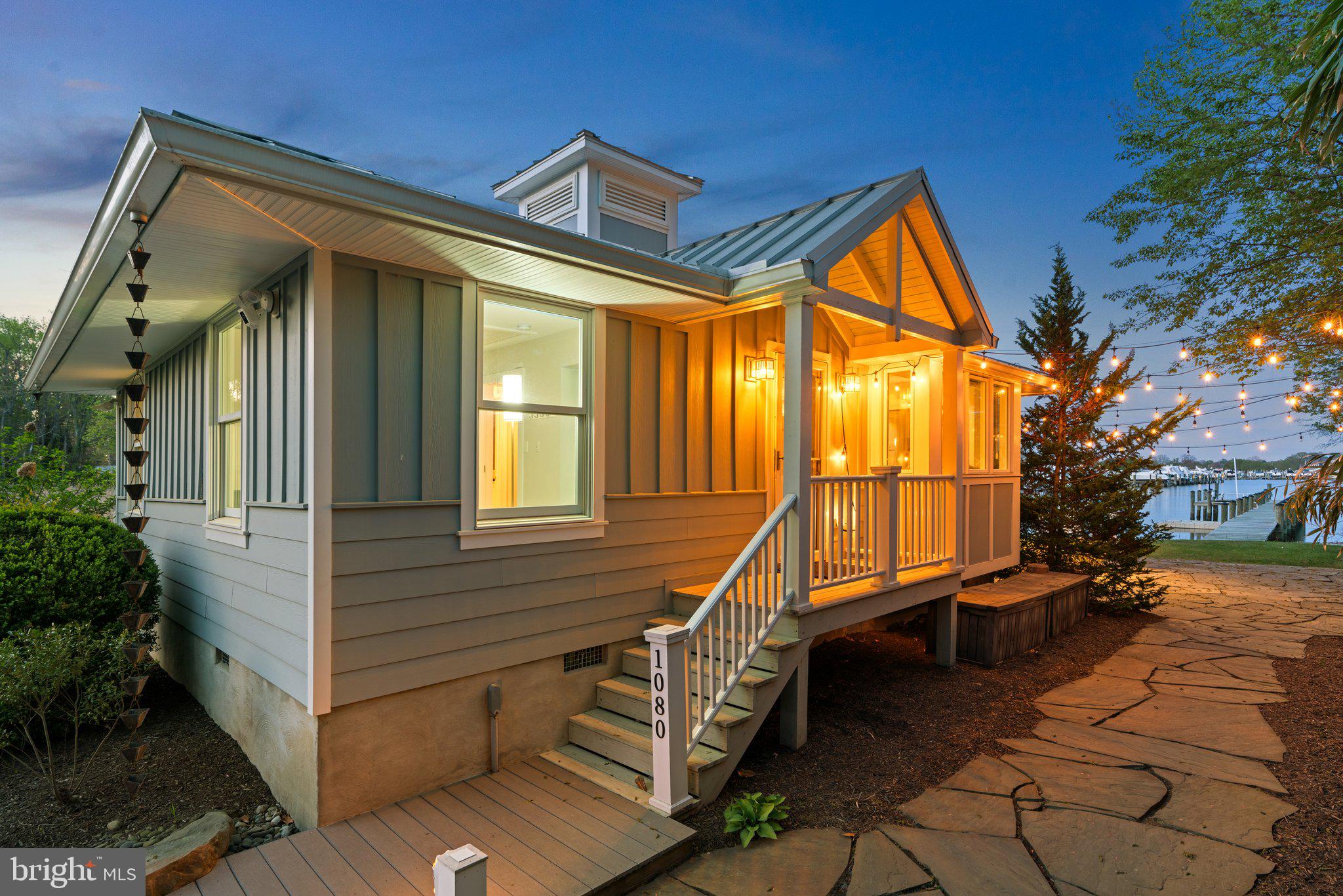 1080 Mayo Road Edgewater, MD 21037 - Photo 3 of 57 a view of wooden house with a large windows