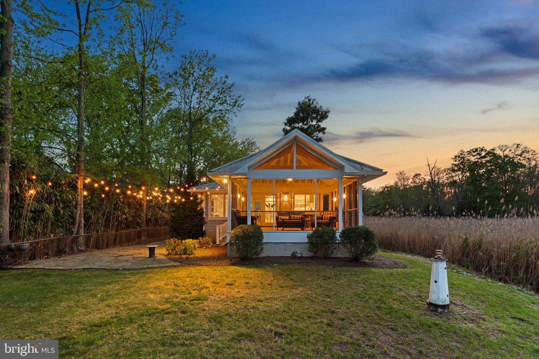 1080 Mayo Road Edgewater, MD 21037 - Photo 36 of 57 a front view of a house with garden