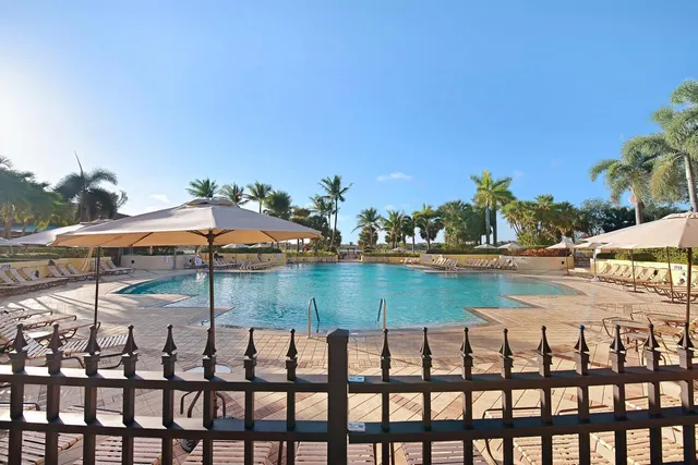 a view of swimming pool from a balcony
