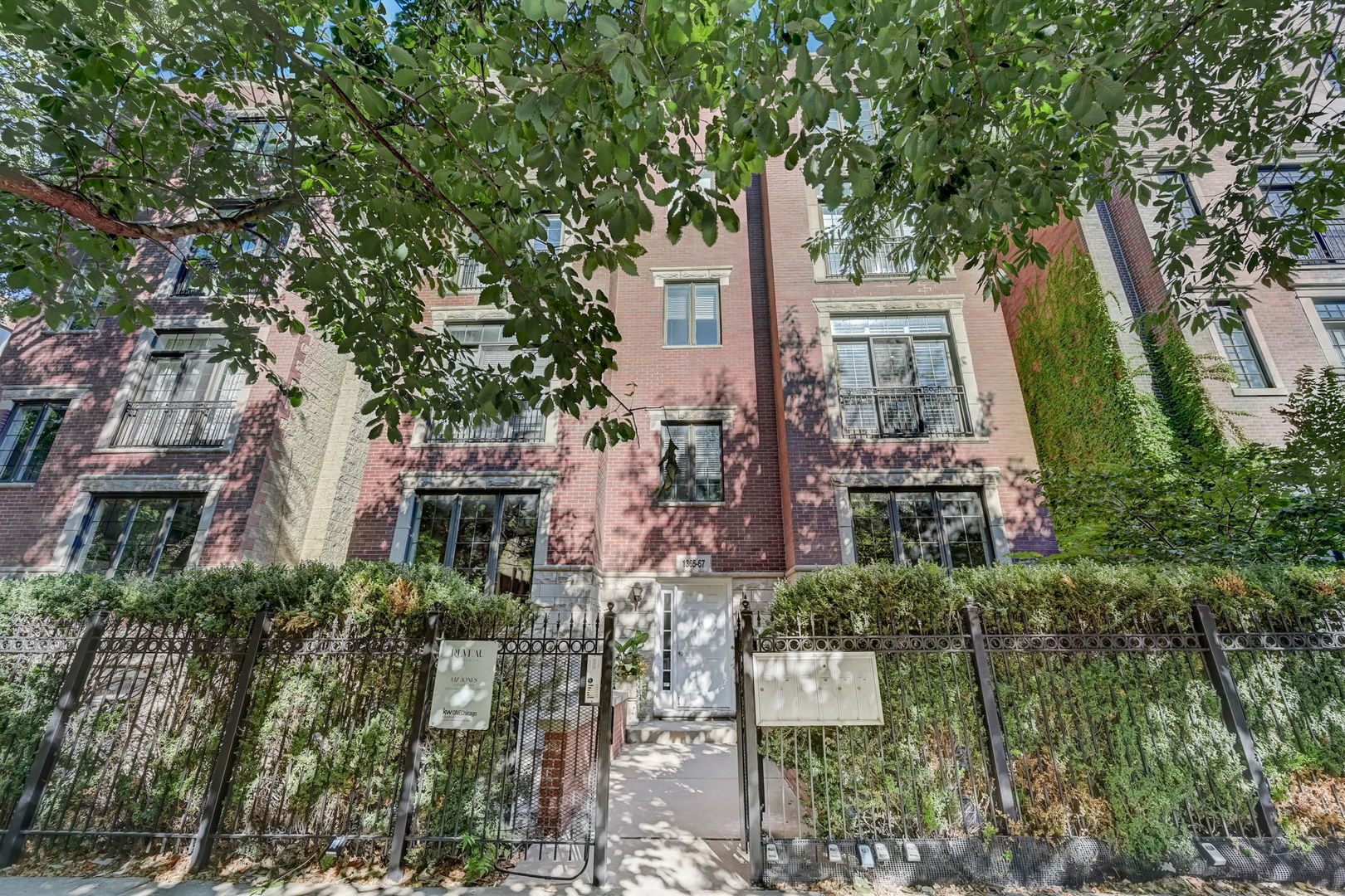 1367 North Mohawk Street, Unit 3N Chicago, IL 60610 - Photo 1 of 37 a front view of a multi story building with a yard