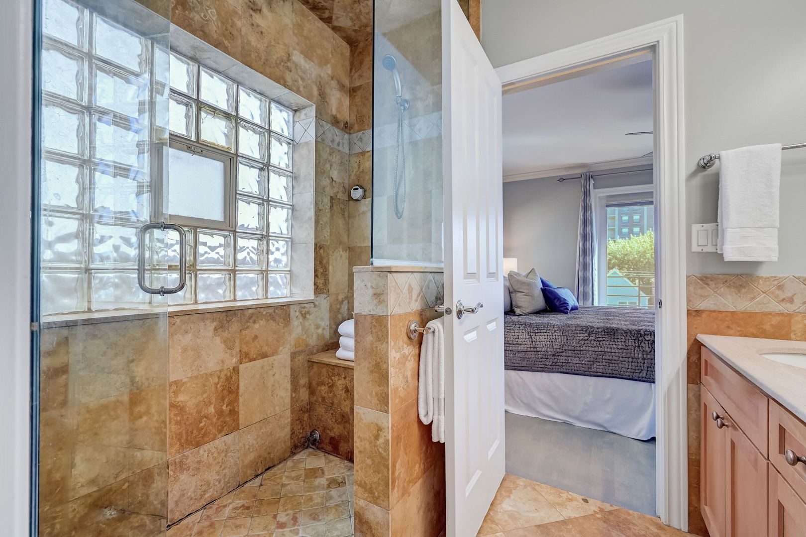 1367 North Mohawk Street, Unit 3N Chicago, IL 60610 - Photo 23 of 37 a en suite bathroom with a granite countertop shower a mirror and a sink