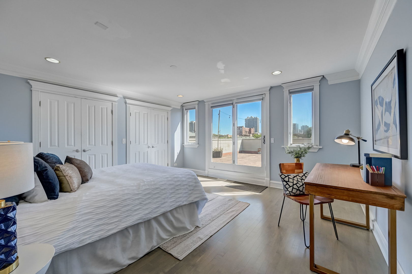 1367 North Mohawk Street, Unit 3N Chicago, IL 60610 - Photo 27 of 37 a bedroom with a bed and wooden floor