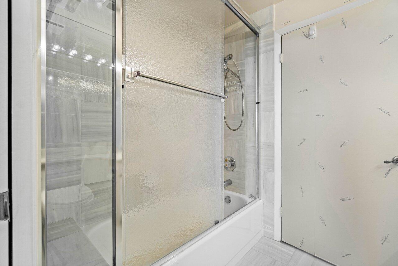 7235 Promenade Drive, Unit K401 Boca Raton, FL 33433 - Photo 24 of 39 guest bathroom