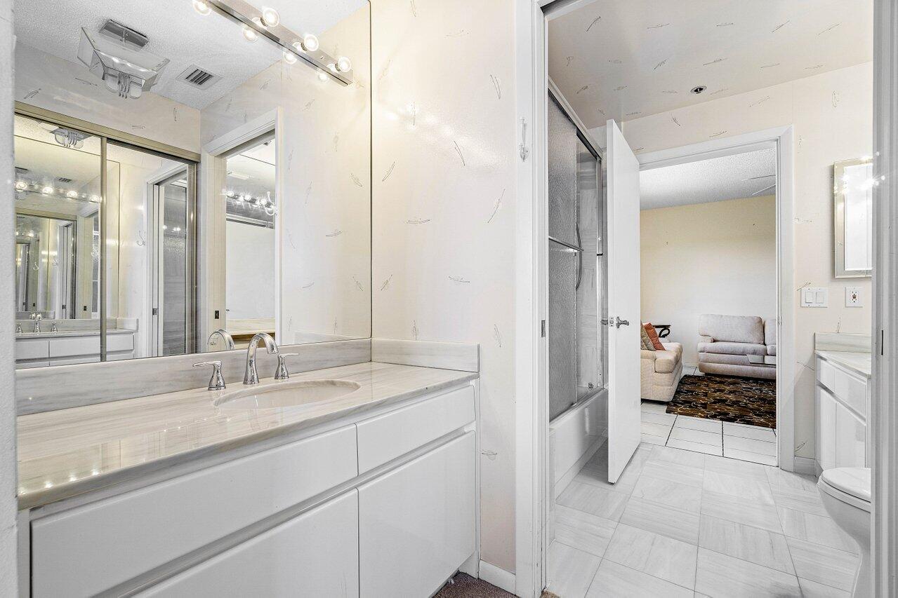 7235 Promenade Drive, Unit K401 Boca Raton, FL 33433 - Photo 25 of 39 guest bathroom