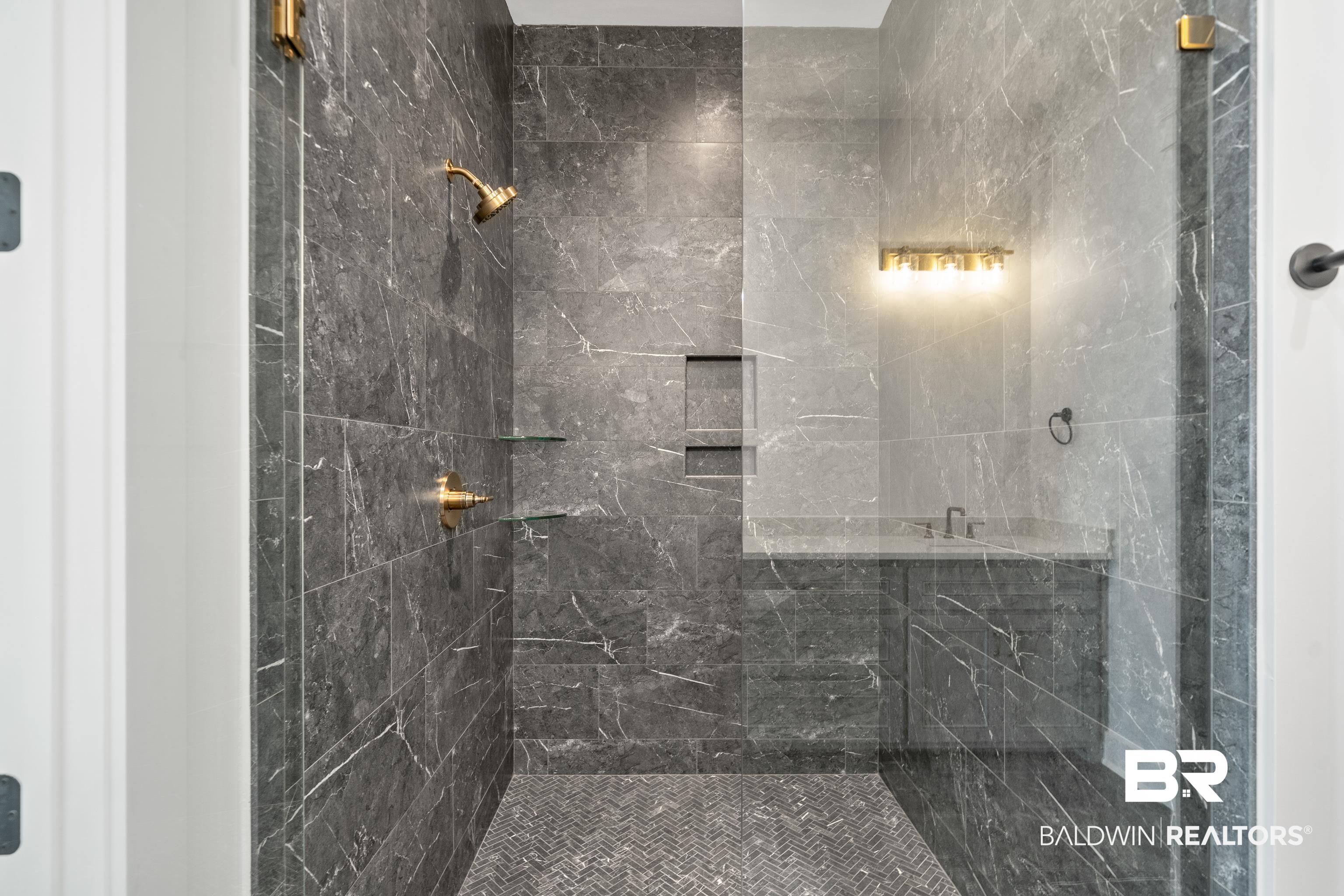12453 County Road 1 Fairhope, AL 36532 - Photo 15 of 33 Bathroom with a tile shower