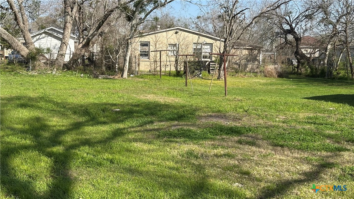 2606 Hackberry Street Victoria, TX 77901 - Photo 2 of 2 a view of an apartment with a big yard