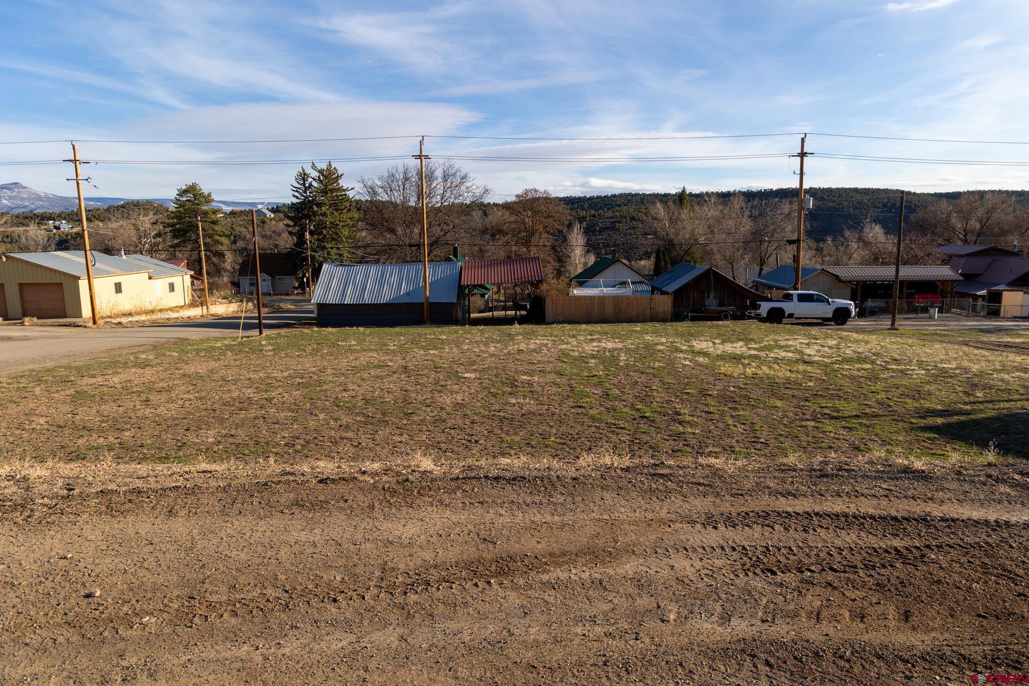 410 Highway 92 Crawford, CO 81415 - Photo 11 of 14 a street view with tall buildings