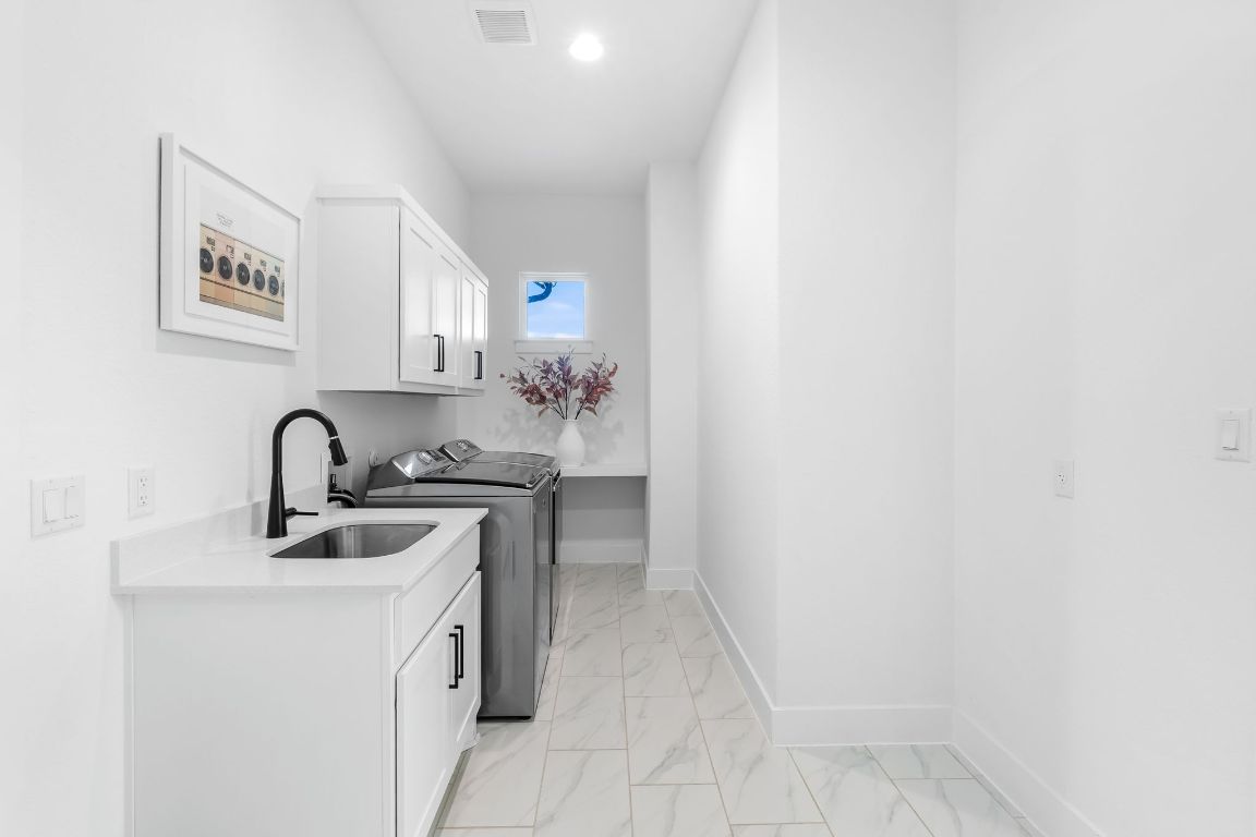 4612 Destination Way Jonestown, TX 78645 - Photo 23 of 37 a view of entryway with kitchen sink