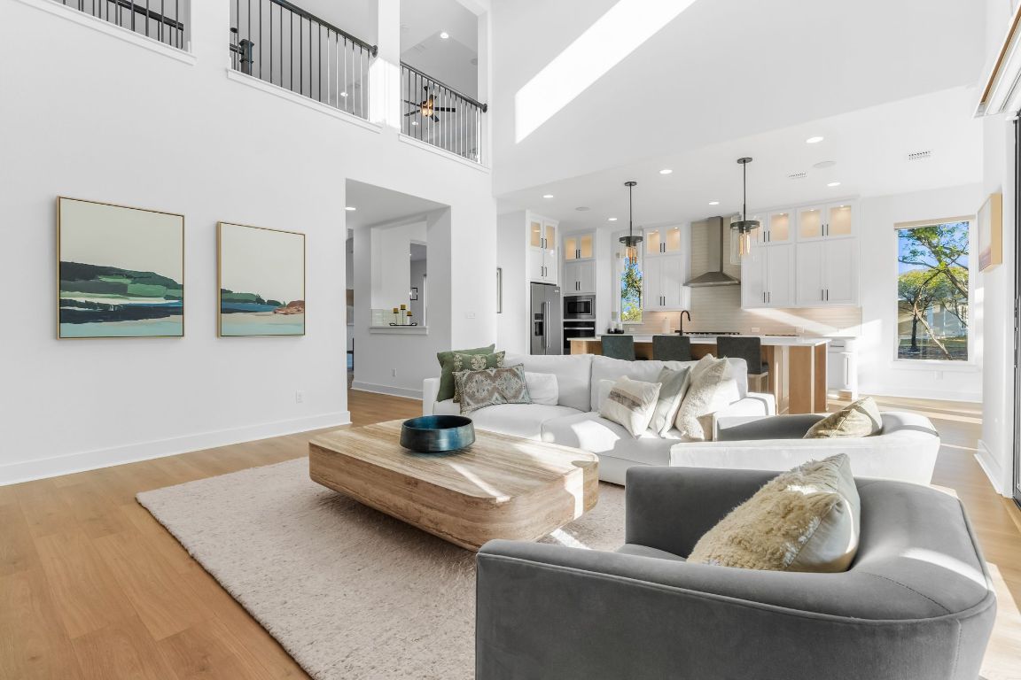 4612 Destination Way Jonestown, TX 78645 - Photo 4 of 37 a living room with furniture and a couch